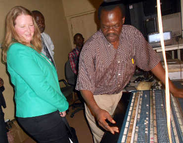 The US Cultural Affairs Officer Ms. Lisa Larson is shown the Conso used by the National Theatre's technical team