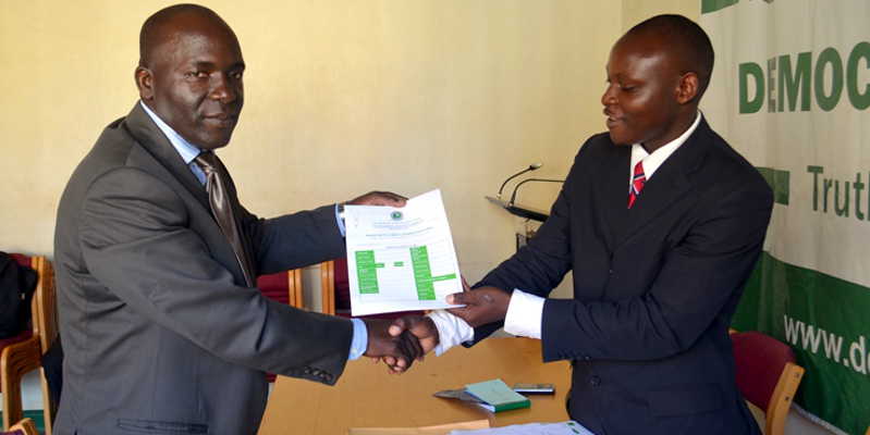 Entebbe Mayor Vincent Mayanja 'Depo' picking nomination forms from DP's administrator Peter Ssempijja