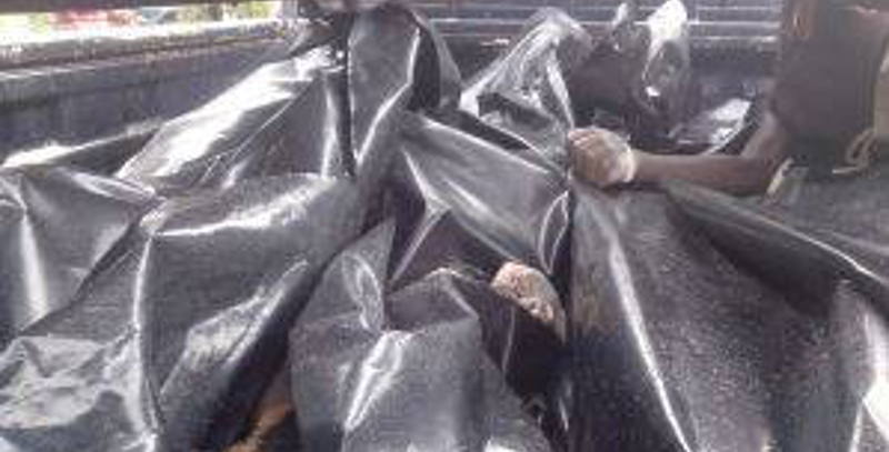 Bodies of beach-goers were put in plastic bags after they were retrieved from Lake Victoria