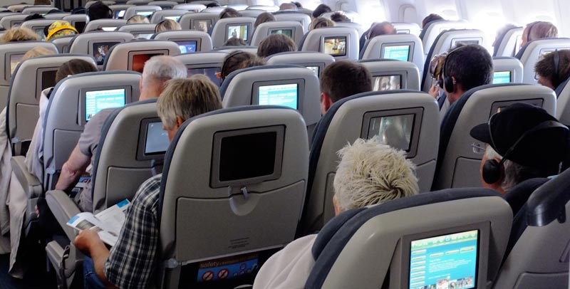 AIRBORNE: Passengers inside an aircraft