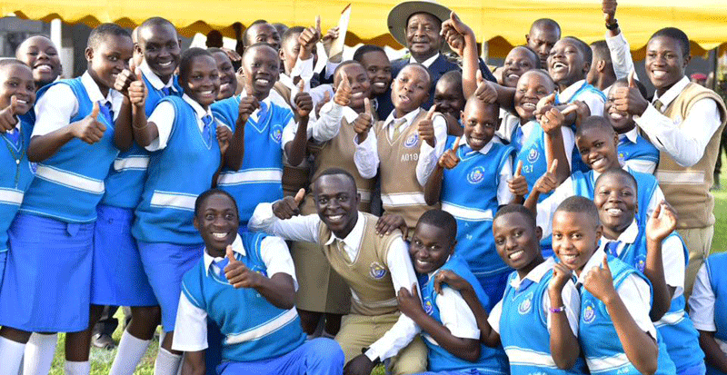 Student with President Museveni during World Teachers day. They also need to be understood