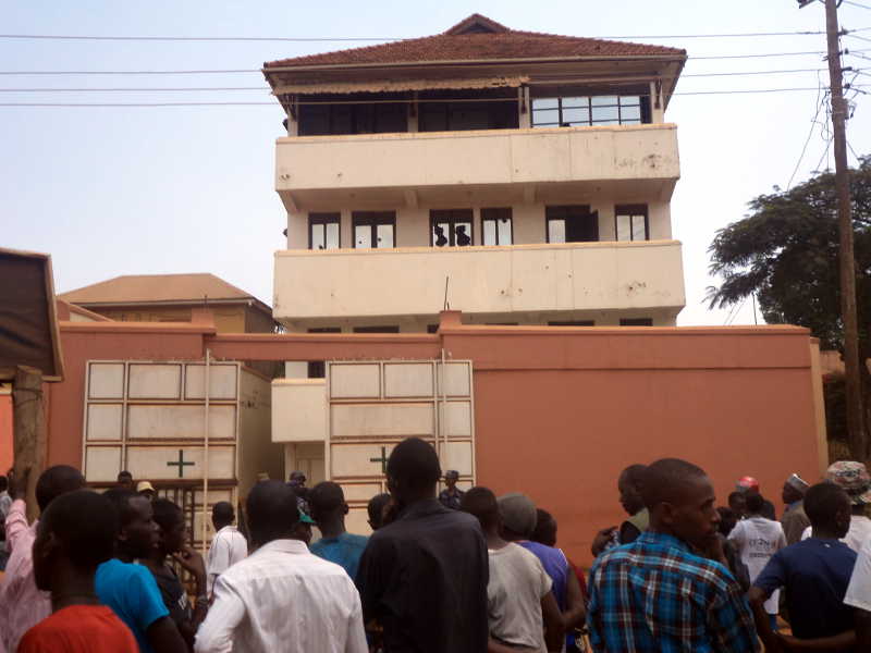 voters outside the house in Makinye where the man with pre-ticked ballot papers disappeared