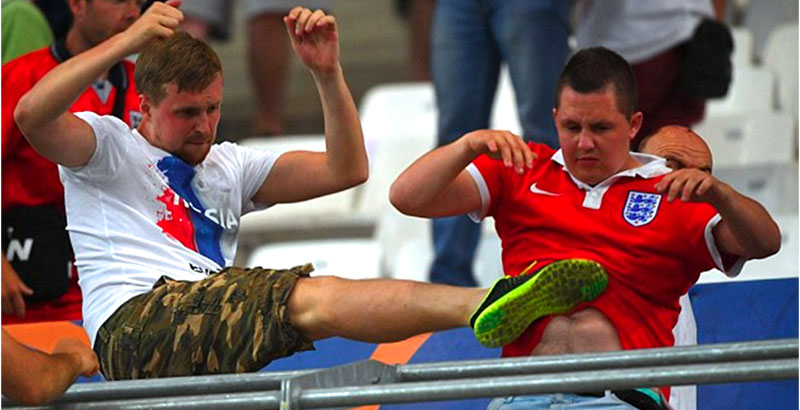 UNBELIEVABLE HOOLIGANISM: Russian supporters attacked England fans after the final whistle of their 1-1 draw
