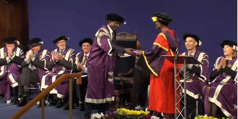 Winnie receiving the award