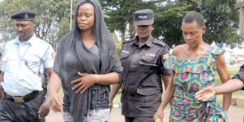 Suspected Drug Traffickers being led by Entebbe Police