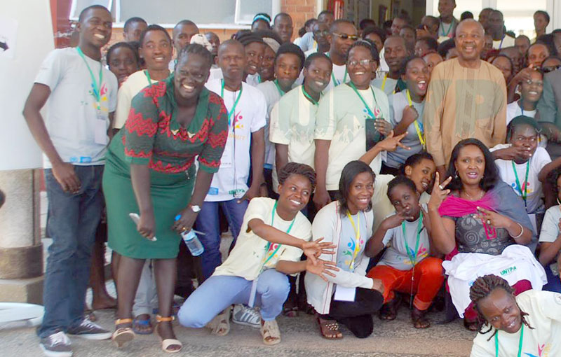 Participants pose for a photo after the conference