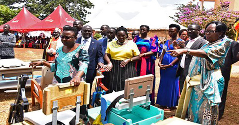 Speaker of Parliament inspecting medical equipment with Kalangala district leadership