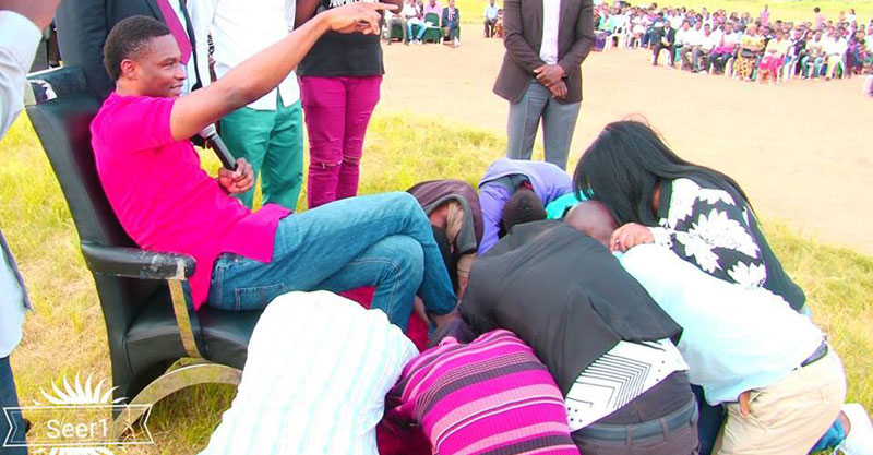 A pastor in Zambia makes believers kiss his feet