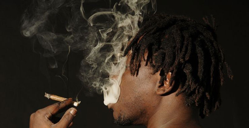 Marijuana smoker getting high