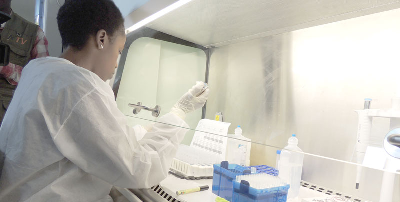 A physician working on EID samples in Butabika hospital
