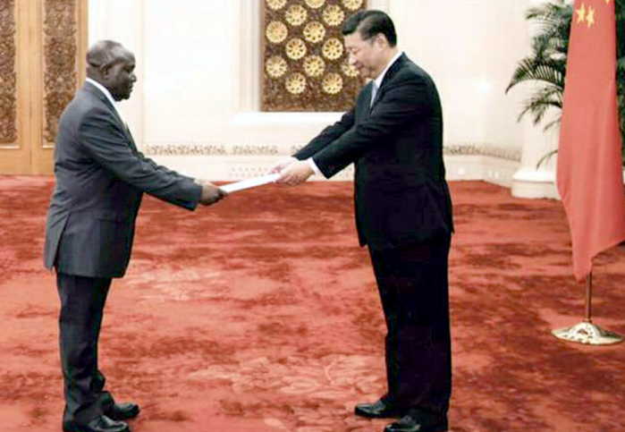 Dr. Kiyonga presenting his credentials to the China's President Xi