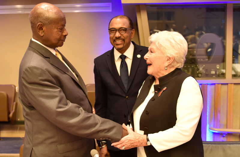 President Museveni shares a light moment with Madame Line Renaud, an 89 year old renown French singer during the high-level meeting on AIDS. UNAIDS Boss Michel Sidibe witnessed the meeting