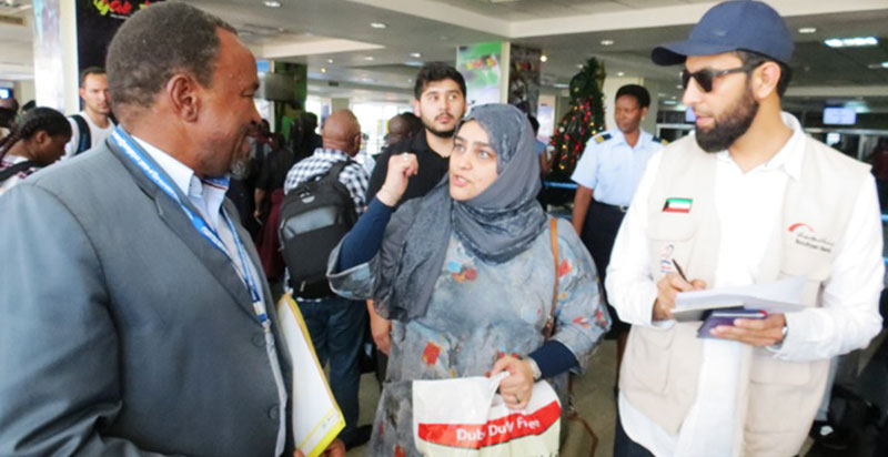 The Director of the IICO Abdul Aziz Muhammad(R) welcomes the doctors at Entebbe Airport 