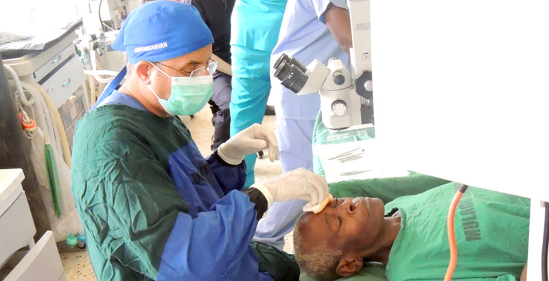 The doctor removinga a cataract from a patients eye