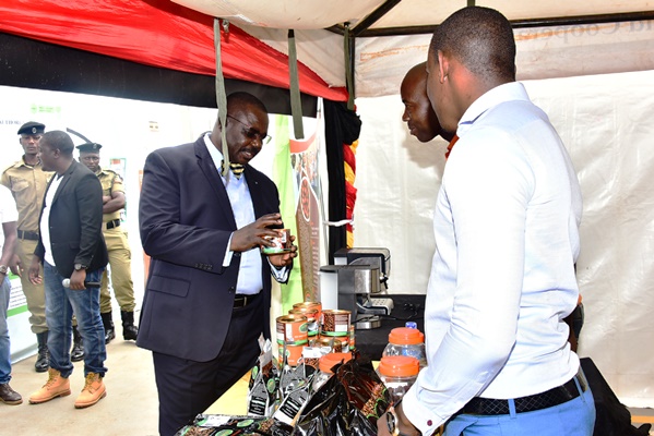 Deputy Speaker Jacob Oulanya visits a stall during the parliament Week