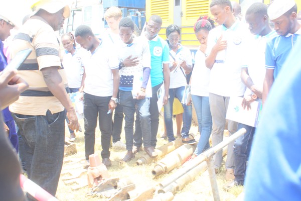 students learning about drilling machines