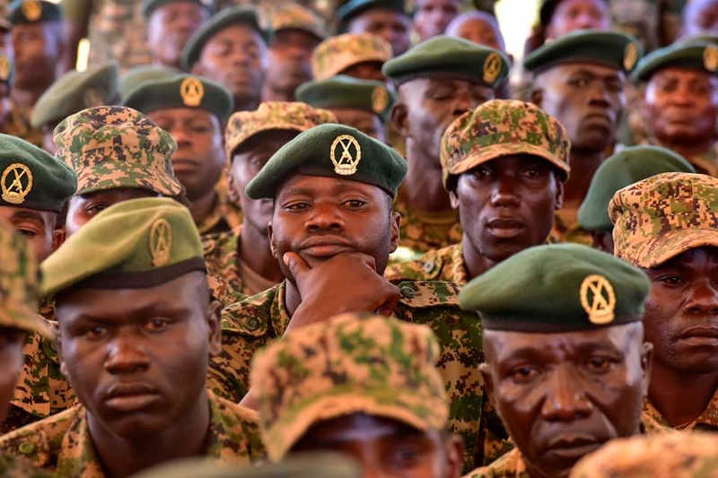 Members of UPDF Infantry 1st Division at Kaikiri liste to President Museveni lately