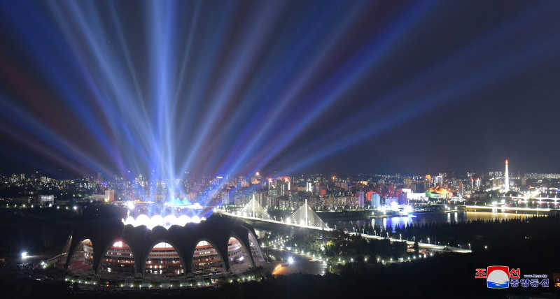 Mayday Stadium with a function at night