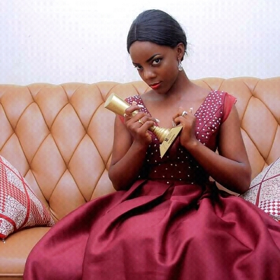 Leilah Nakabira with one of her accolades