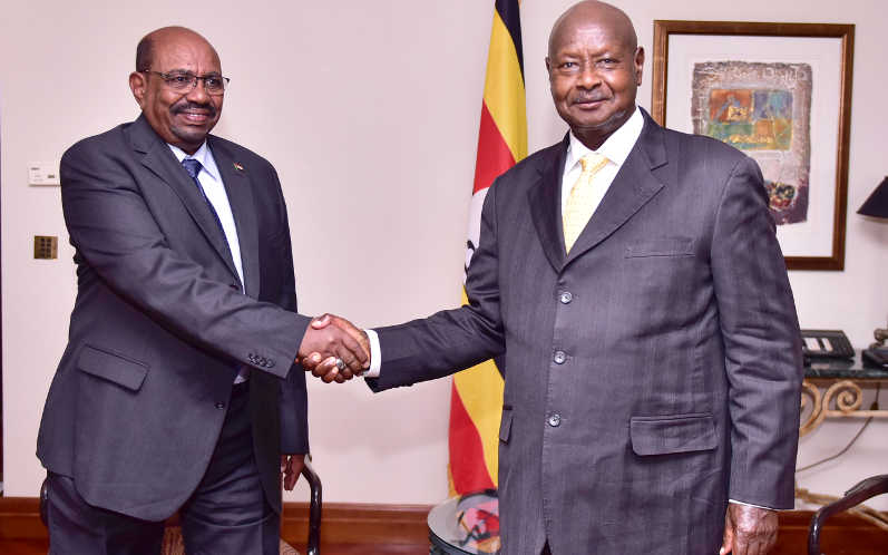 President Yoweri Museveni (right) meets President Bashir of Sudan at the Sidelines of the the 32nd AU Summit in Addis Ababa. Bashir's departure is attracting focus and attention to Museveni's long stay in power. 