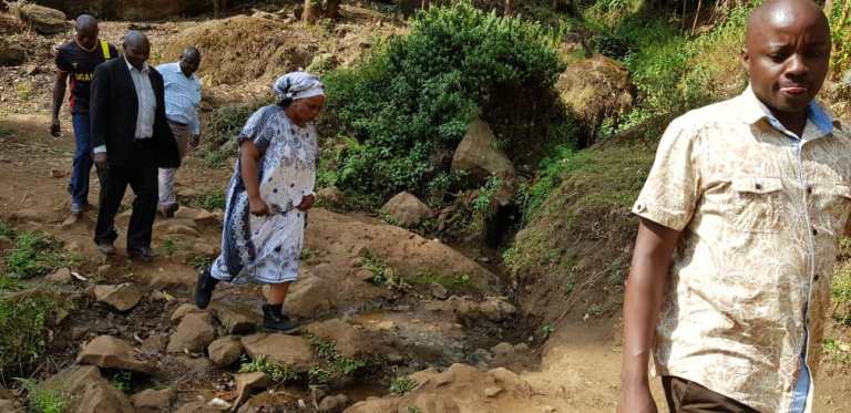 Hon inspecting the roads and bridges
