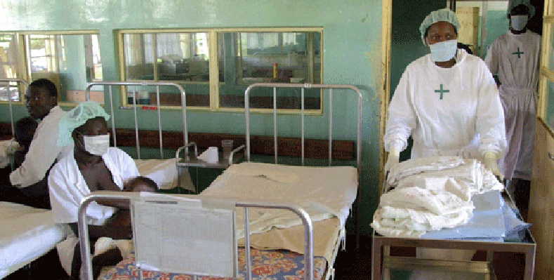 A nurse walks into a ward for suspected Ebola patients. The disease wrecked havoc in Uganda through several outbreaks