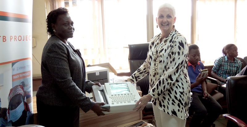 US ambassador Deborah R. Malac hands over some of the donated medical equipment to state Minister of health for general duties Sarah Opendi at the ministry of health