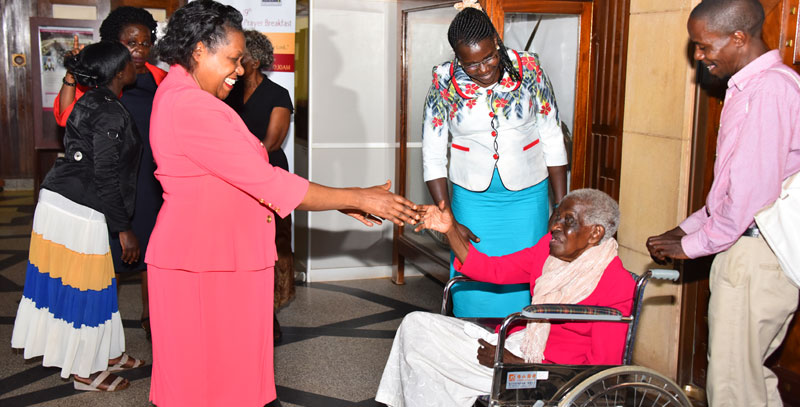 CLERK-TO-PARLIAMENT-SHAKING-HANDS-WITH-HON-FLRORENCE-LUBEGA-_5348